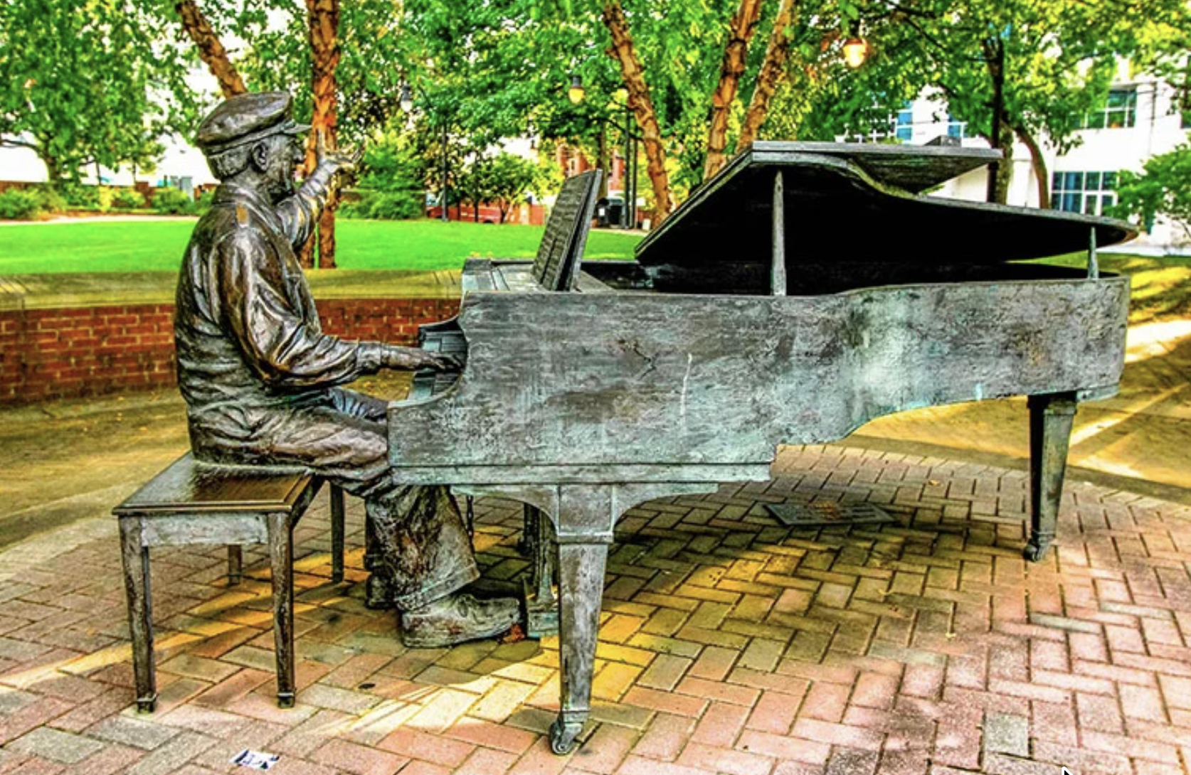 Bronze statue of Owen Bradley at the piano, Owen Bradley Park, Music Row